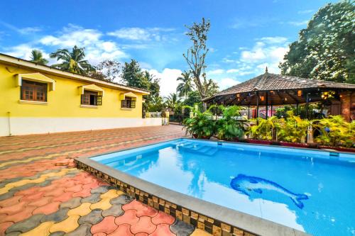 Chapora Hotel | FabHotel Yoyo Cottage With Pool - Nr Chapora Fort