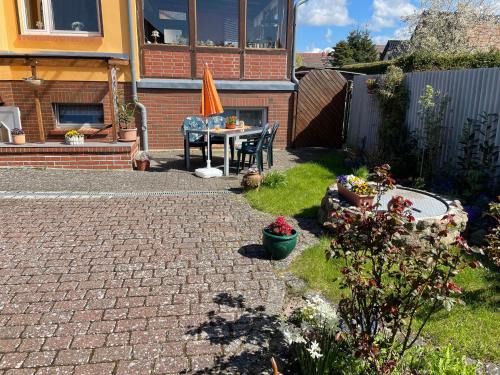 Ribnitz Apartment | Ferienwohnung Zum Anmselgarten
