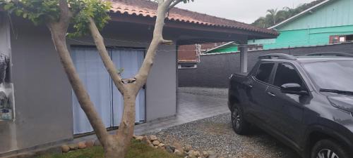 Costa e Silva Apartment | Flat nos fundos com estacionamento