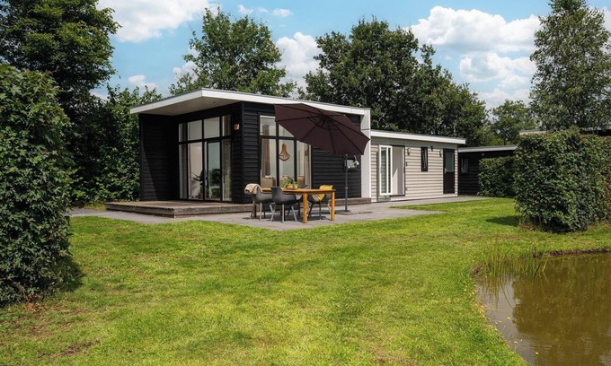 Municipality of Rijssen-Holten Resort | Forest lodge with hot tub - 4 people