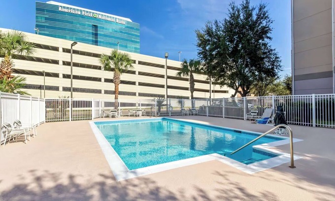 Chinatown Hotel | Fun and Relaxation Await in Chic Houston Room with Pool Near Memorial City Mall