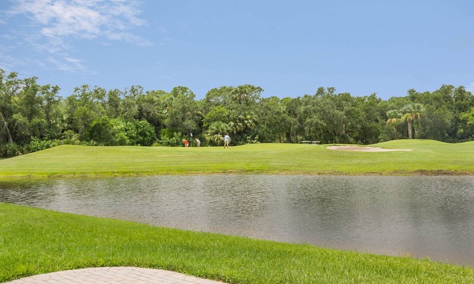 New Smyrna Beach House | Golf Course View Townhouse with a 2 Car Garage. Water Views! 1929T