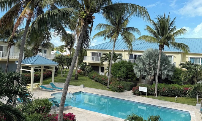 Grace Bay Hills House | Grace Bay Escape - Walk to #1 Beach & Grace Bay Strip. 2 Bedrooms, Shared Pool