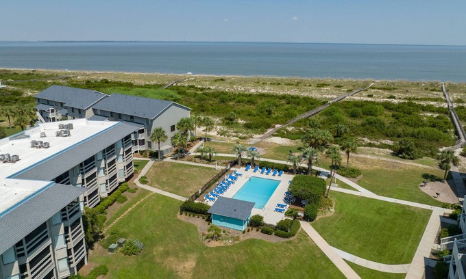 Oceanmarsh Subdivision Condo | Harbor Island Bliss: 2BR Condo, Beach Access, Resort Pool, & Stunning Views!