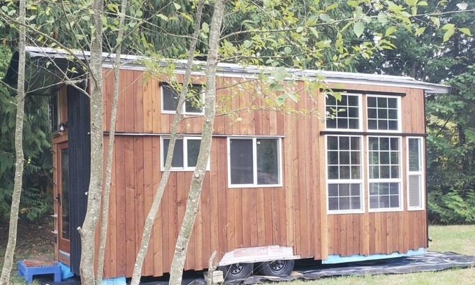 Port Ludlow Bed & Breakfast | High end tiny home with tons of light, exposes serene views of mature forests.