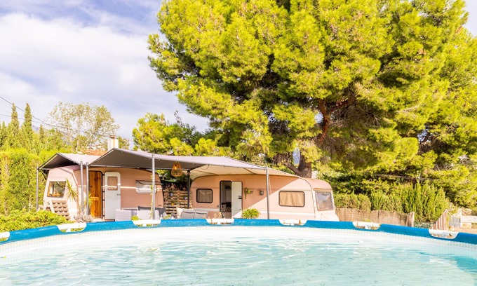 La Nucia RV Rental | Holiday Home "Caravana-Glamping Casa Tortuga" with Mountain View, Shared Pool & Wi-Fi