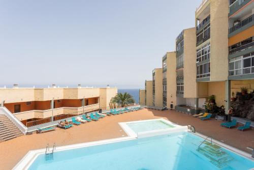 Las Caletillas Apartment | Home2Book Sea View Terrace Pool Caletillas