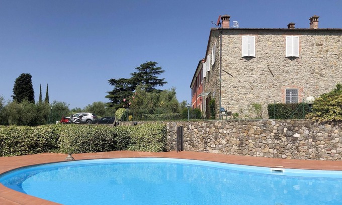 Fosdinovo Apartment | Homerez - Appartement 6 km away from the beach for 4 ppl. with shared pool