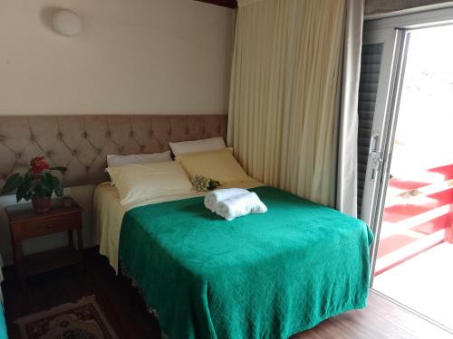 Jardim Andira Hotel | Hospedagem Virginia Bracelli