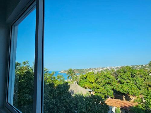 Brisas de Zicatela Hotel | Hotel Familiar Abejac