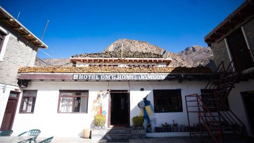 Mustang Hotel | Hotel Oms Home