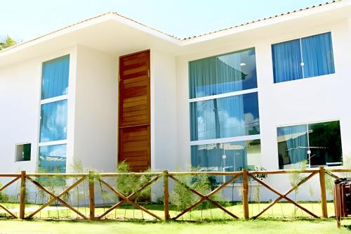 Parafuso House | House 6 Suites 80 Meters from the Beach in Guarajuba