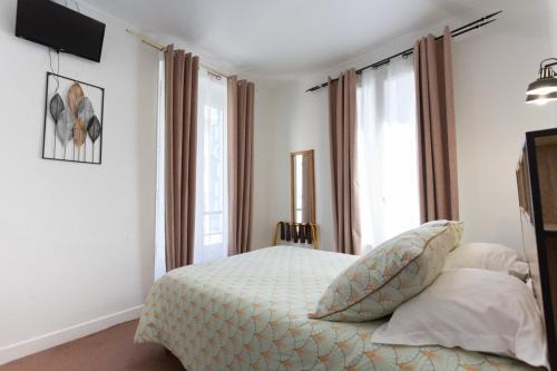 Quartier de la Folie-Mericourt Hotel | Ideal Hotel