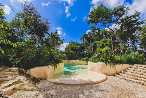 Tulum City Center Apartment | IIK Tulum by Groovy Stays- A Hip Condo-Hotel with WIFI, Rooftop, Pool, Sleeps 6