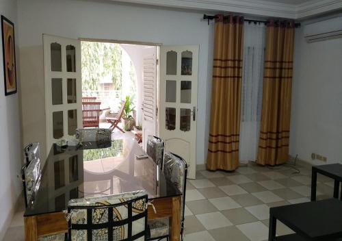 Lome Apartment | iléos, appartement meublé 4 pièces - Salon, cuisine, 3 chambres Lomé Tokoin Hôpital Protestant