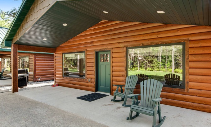 Conover House | Inviting dog-friendly cabin with hot tub, fireplace, patio, grill, central AC, & W/D