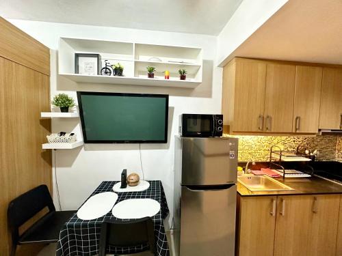 Barangay 76 Apartment | Kathys Crib with balcony Pool view at Shell Residence