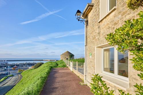 Port-en-Bessin-Huppain House | La Tour Vauban - Vue sur le port