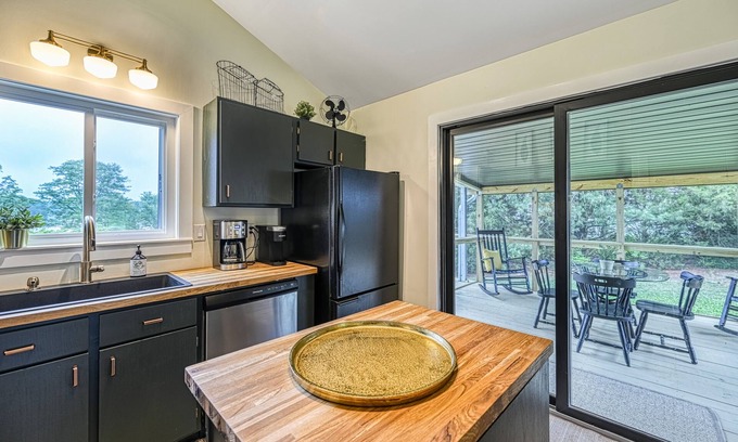 Aspen Hill House | Lakefront retreat with deck, patio, dock, central AC, and washer/dryer