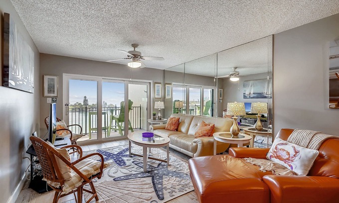 Sunset Beach Condo | Land's End 403 building 5 TOP Floor -Remodeled, Panoramic Water Views