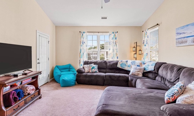 Sunset Beach Condo | Lovely condo with water view, balcony, full kitchen & W/D - dog-friendly