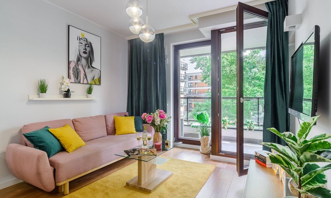 Wola Apartment | Lumina apartment with balcony Warsaw