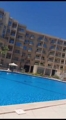 Hurghada Apartment | Luxe flat met privé strand en zwembaden