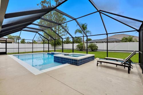 Palm Harbor House | Luxury Heated Pool & Spa Fenced Yard & Beach Gear