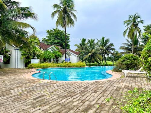 Siolim Apartment | Luxury Pool Side Studio With Private Balcony