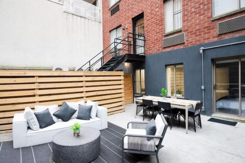 Central Park South Hotel | Massive 1BR w Private Patio in Upper East Side