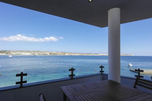 Għadira Apartment | Mel 1 2bed Seaview In Ghadira By Homely