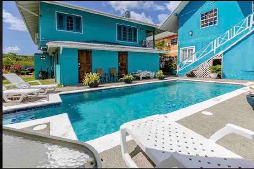 Bon Accord Village Apartment | Modern Apartment near Pigeon Point with Breakfast
