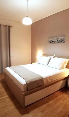 Ampelokipoi Apartment | Modern home, 6' from the Metro