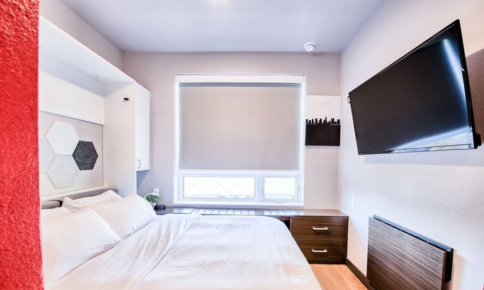 University District House | ⭐ Modern Tiny Studio 🌃 Free Parking, Hot Tub, Fitness Center, TV, WiFi, & More!