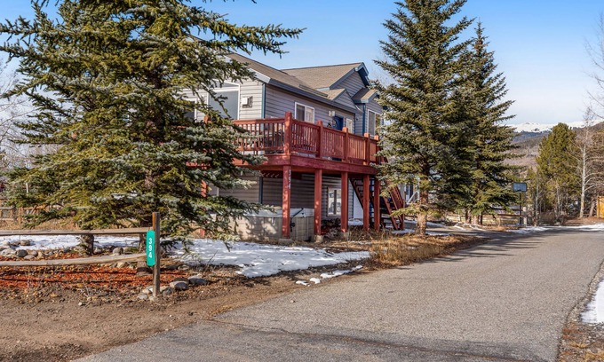Willow Grove House | Mountain view home with private hot tub, fireplace, charming interior & deck