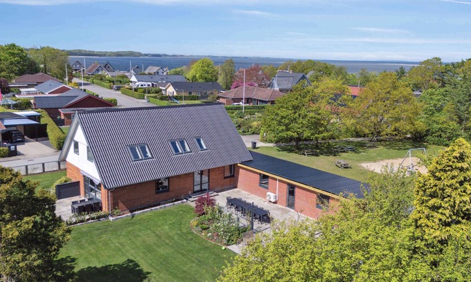 Hvalpsund Villa | Near beach and golf, with multi-purpose room.