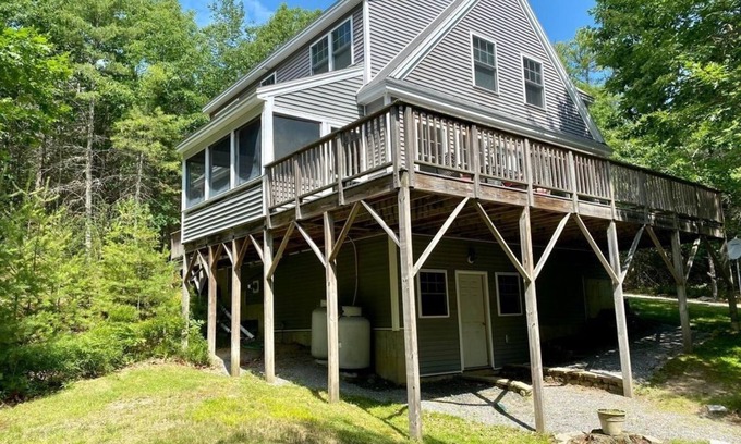 Mac Mahan House | Nestled in the private woods of Georgetown, Maine rests this 3 bedroom, 2.5 bath beauty!