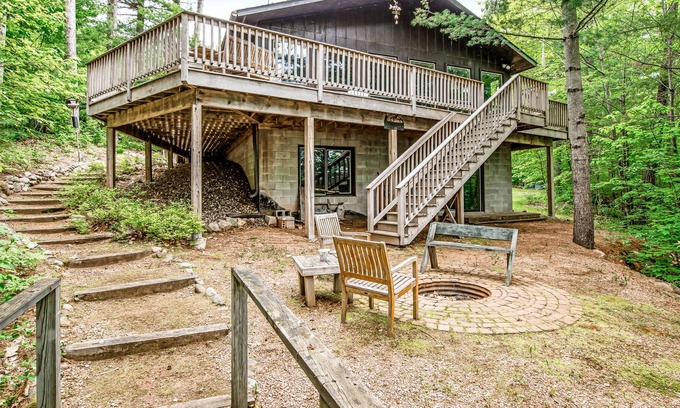 Lac du Flambeau House | New listing! Rustic retreat in the woods w/ wood-burning fireplace & large deck!