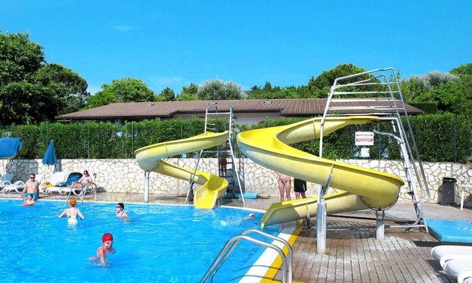 Cisano House | Nice apartment in villa for 6 people with pool, WIFI, A/C and terrace