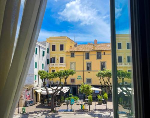 Nettuno Apartment | NIMPHAEA BLUE APARTMENT - Elegant Central Flat, Walk to Beach & Train Station