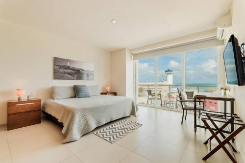 Puerto Juarez Apartment | *OCEAN Beachfront 4 BDR with pool by Casa Paraiso*