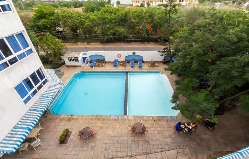 Mombasa Apartment | Ocean Blue Retreat-3 minute walk to Nyali Center and 3 minute walk to the Beach
