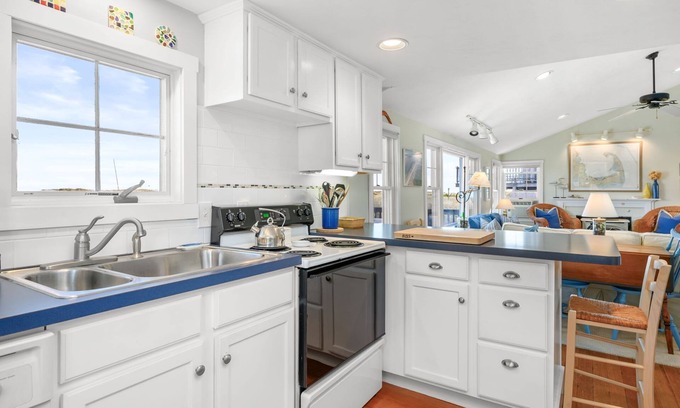 Sagamore Beach House | Oceanfront at Sagamore Beach with clean, crisp, Cape Cod interior and coastal furnishings