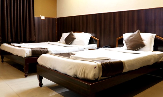 Six Mile Hotel | Om Shree Residency