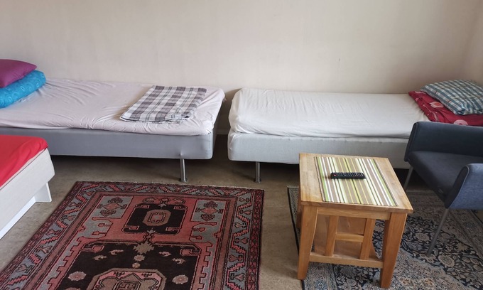 Angered Apartment | One large room with 3 single beds. Max for three people 12 min from city center