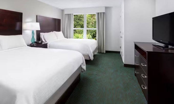 Florida Central Atlantic Coast Hotel | Orlando Suite Offering Living + Rest Areas for Theme Park or Family Stays