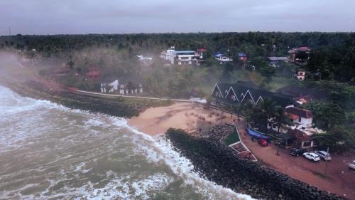 Varkala Hotel | Palm TreeHeritage Beach Resort