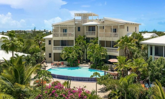 Leeward Settlement House | Pelican's Nest #2,#3 and #4 · Oceanview 9 Bed Home - Steps to Grace Bay Beach