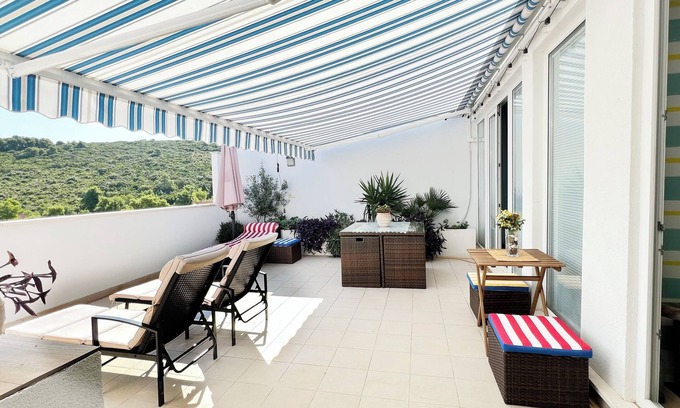 Necujam Apartment | Penthouse with large terrace 50 m from the beach: an oasis of peace and beauty.