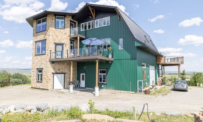 Calgary House | Picturesque countryside acreage with Mountain Views